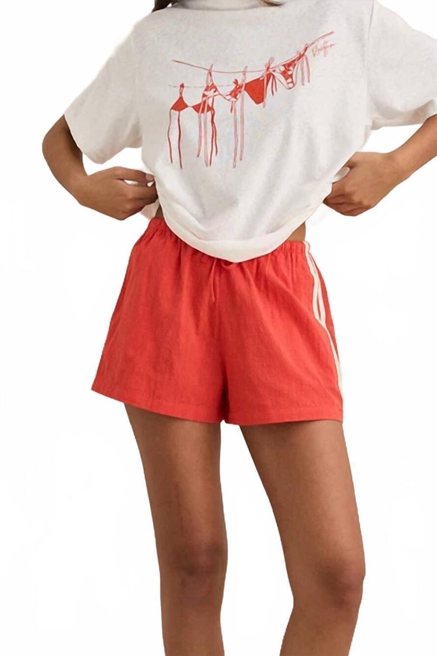 NEW RHYTHM. drawstring side stripes shorts in hot red